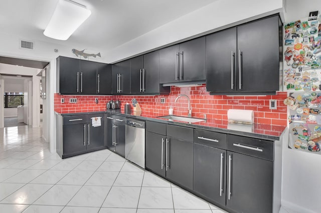 kitchen with sink, backsplash, dishwasher, and refrigerator