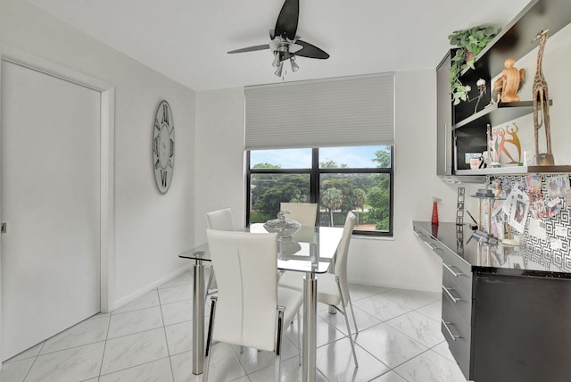 dining area featuring ceiling fan