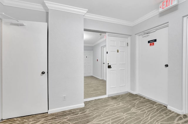 interior space featuring carpet flooring and ornamental molding