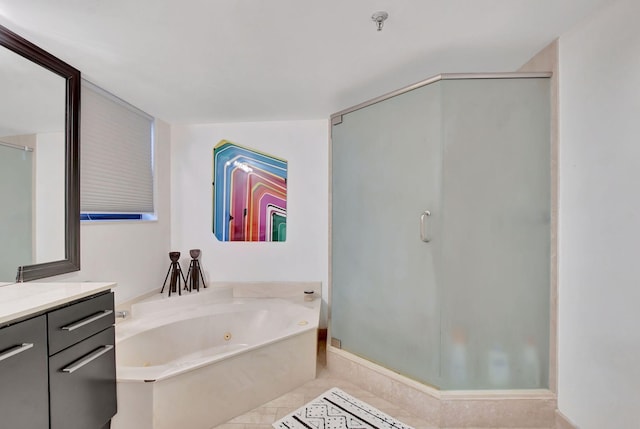 bathroom with vanity, tile patterned floors, and plus walk in shower