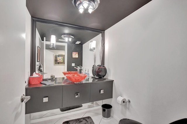 bathroom featuring tile patterned floors and vanity