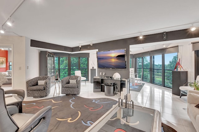 living room with light tile patterned floors and a wealth of natural light