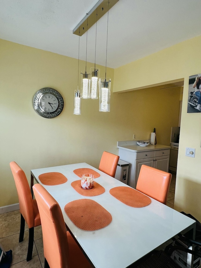 dining room featuring light tile patterned floors