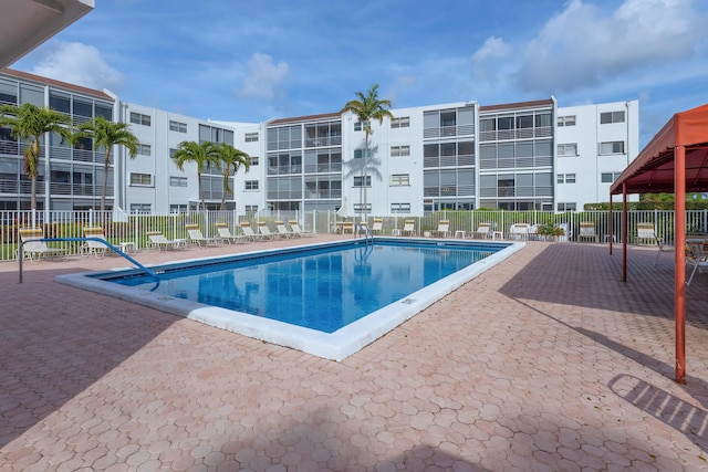 view of swimming pool featuring a patio