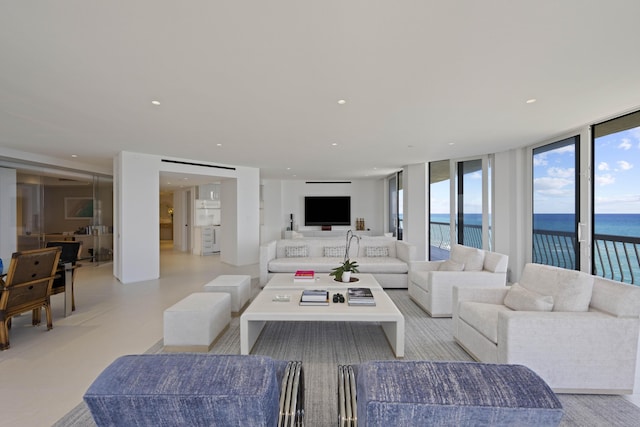 living room with floor to ceiling windows