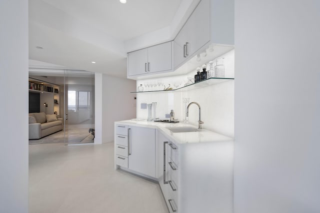 kitchen with sink and white cabinets