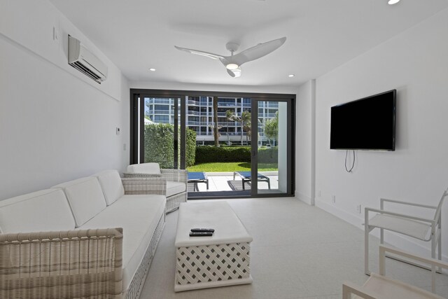 living room with ceiling fan and a wall unit AC