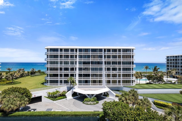 view of building exterior with a water view