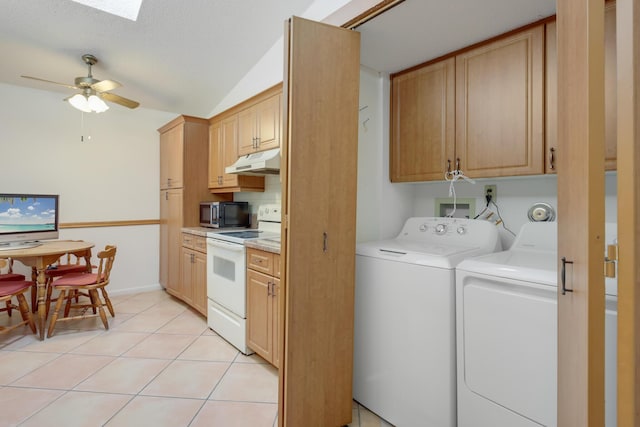 laundry area with laundry area, light tile patterned floors, a skylight, ceiling fan, and separate washer and dryer