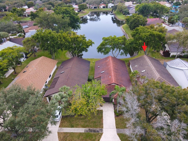 drone / aerial view with a water view