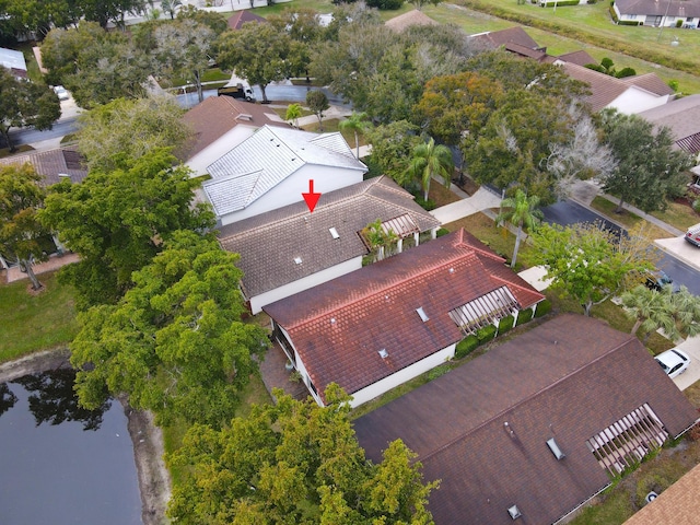 birds eye view of property featuring a water view