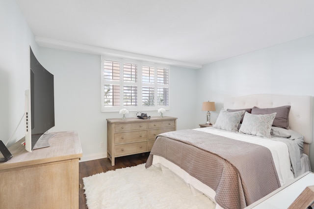 bedroom featuring dark hardwood / wood-style floors