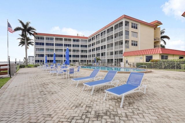 view of swimming pool featuring a patio