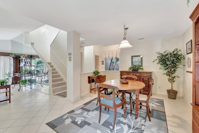 dining room with light tile patterned floors