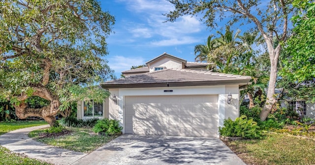 view of front of property with a garage