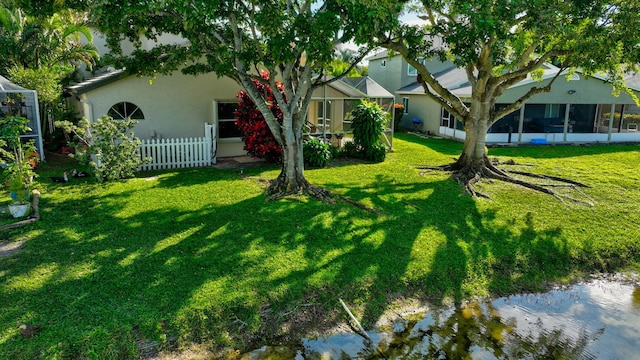 view of yard with a water view