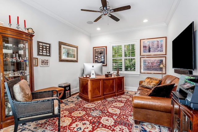 home office with a ceiling fan, crown molding, and baseboards