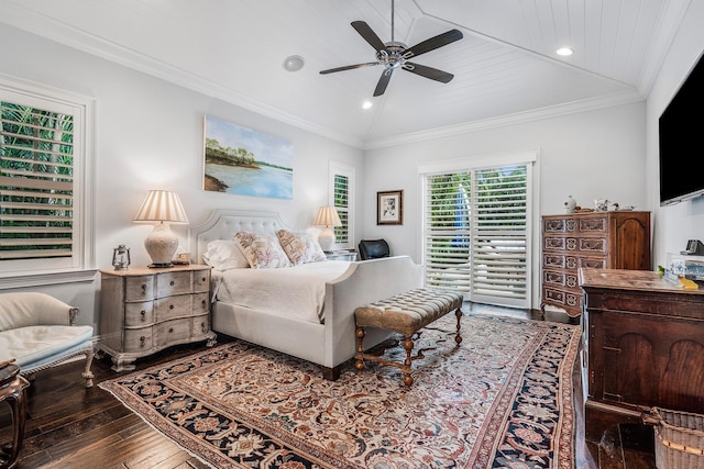 bedroom with lofted ceiling, crown molding, recessed lighting, and hardwood / wood-style flooring