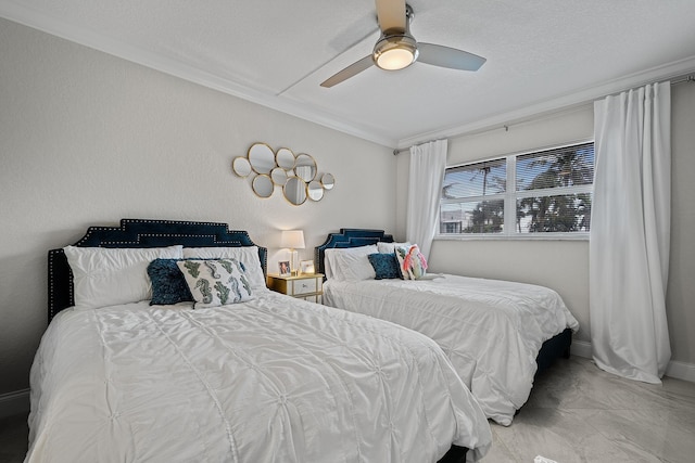 bedroom featuring ceiling fan and ornamental molding