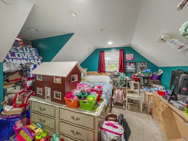 carpeted bedroom featuring lofted ceiling