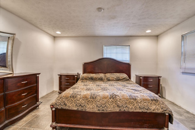 bedroom featuring a textured ceiling