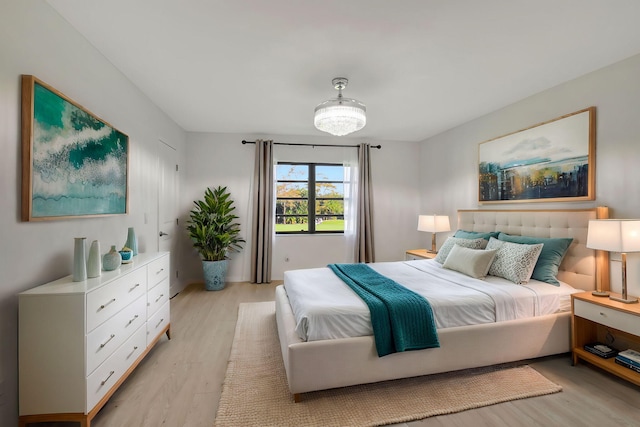 bedroom featuring light hardwood / wood-style flooring