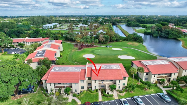8315 Casa Del Lago Unit F, Boca Raton, FL 33433 - drone / aerial view of a large body of water, a golf club, and a tree filled landscape