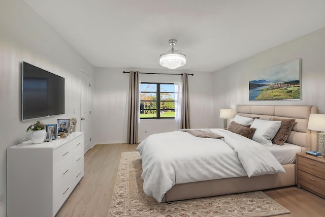 bedroom featuring light wood-type flooring