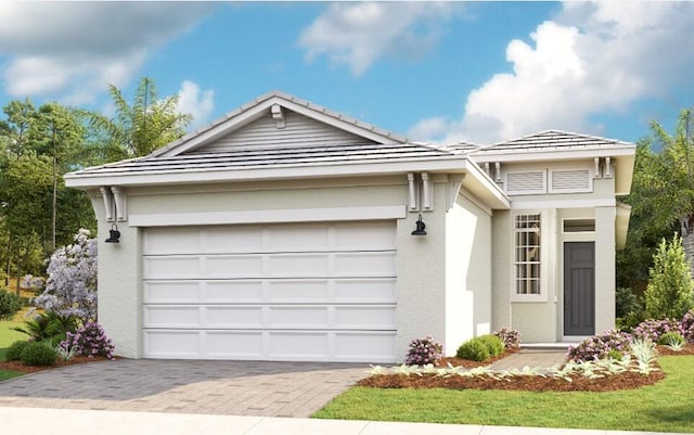 ranch-style house featuring a garage