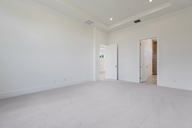 359 SE Via Sangro, Port Saint Lucie, FL 34952 - spare room featuring light colored carpet, recessed lighting, baseboards, and a high ceiling