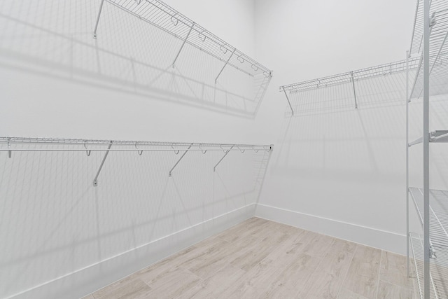 359 SE Via Sangro, Port Saint Lucie, FL 34952 - walk in closet featuring light wood-style floors