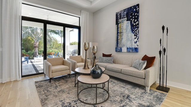 sitting room with hardwood / wood-style floors