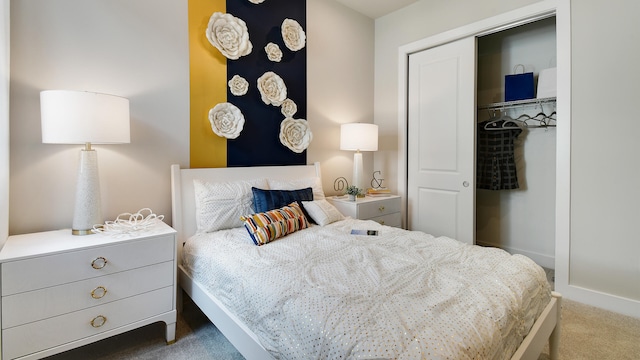 bedroom with a closet and dark carpet