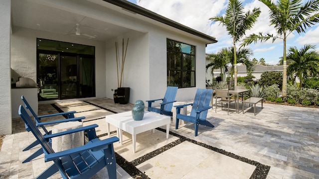 view of patio / terrace featuring ceiling fan