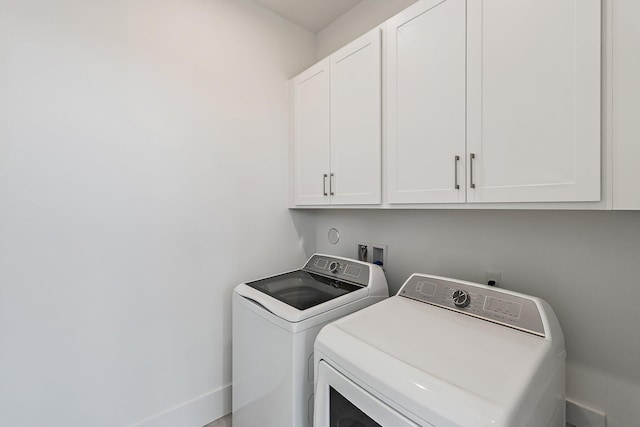 359 SE Via Sangro, Port Saint Lucie, FL 34952 - laundry area with cabinet space and separate washer and dryer