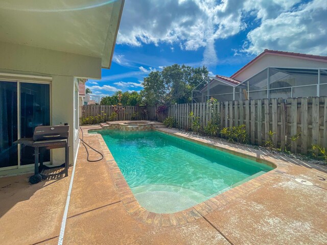 view of front of property with a garage and a front lawn