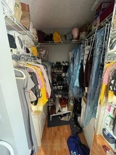 spacious closet featuring hardwood / wood-style flooring