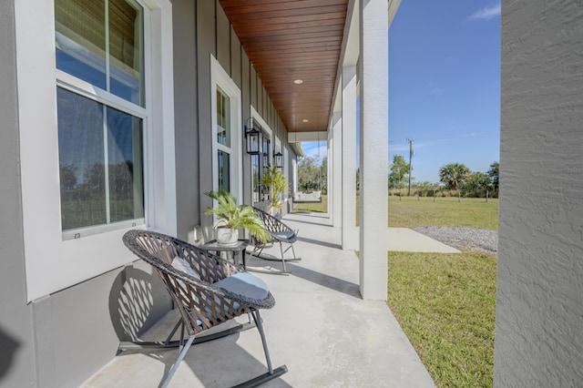 view of patio featuring a porch