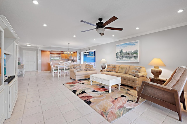 tiled living room with crown molding and ceiling fan with notable chandelier