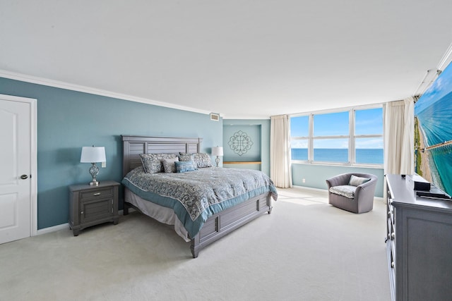 bedroom featuring light colored carpet, crown molding, visible vents, and baseboards