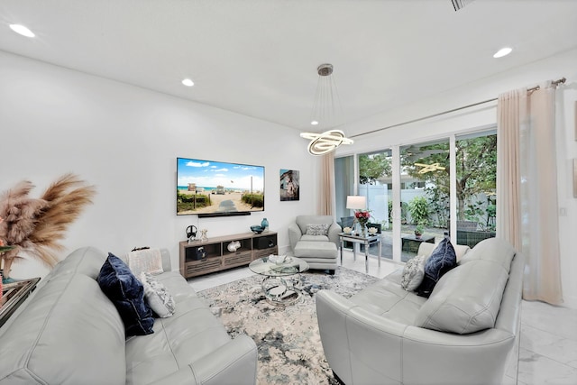 living area featuring recessed lighting