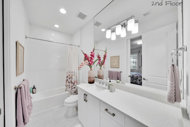 ensuite bathroom with toilet, vanity, connected bathroom, and visible vents