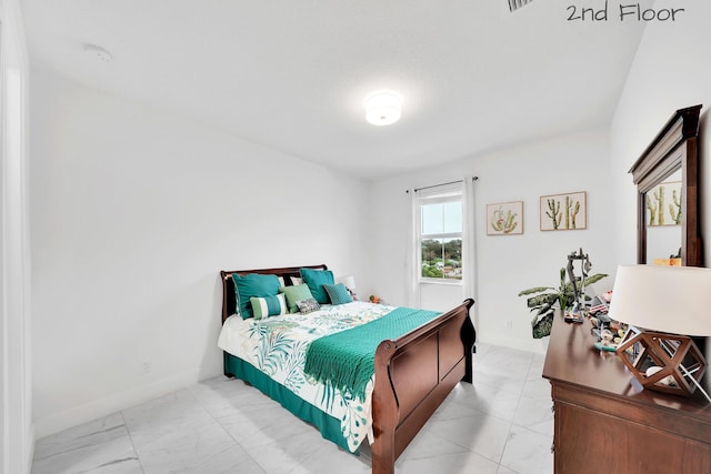 bedroom with baseboards