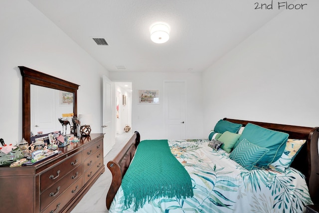 bedroom with visible vents