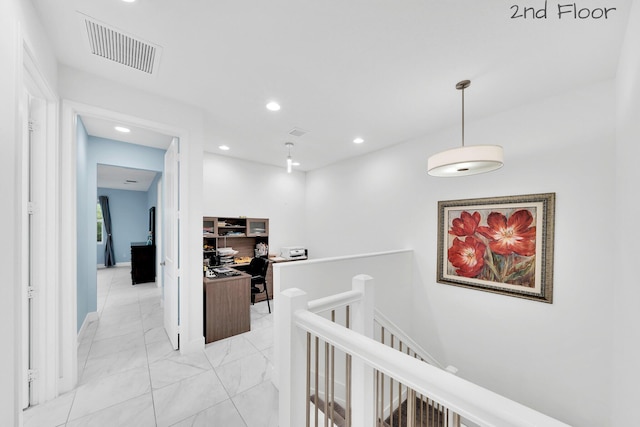 corridor featuring marble finish floor, recessed lighting, visible vents, an upstairs landing, and baseboards