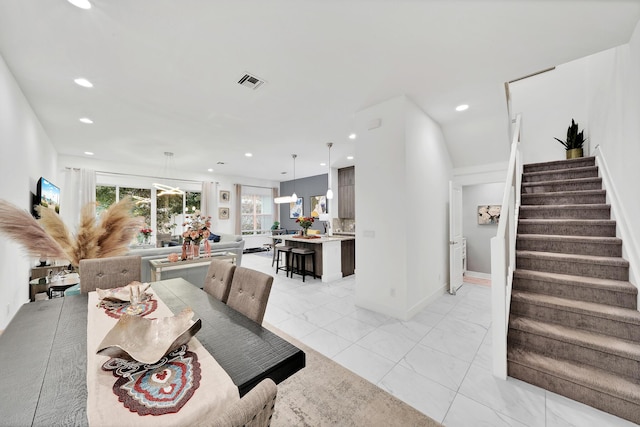 dining space featuring recessed lighting, visible vents, stairway, and baseboards