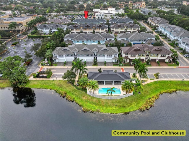 aerial view with a water view and a residential view