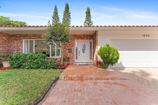 view of front of home with a garage