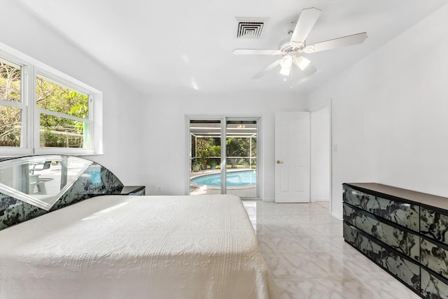 bedroom with ceiling fan and access to exterior