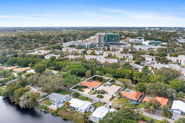 drone / aerial view with a water view